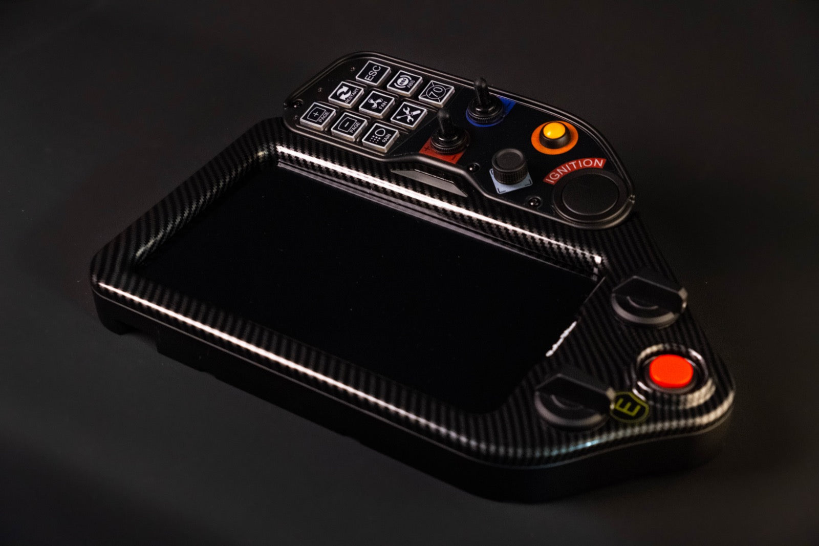 Carbon fiber sim display product photographed in studio lighting