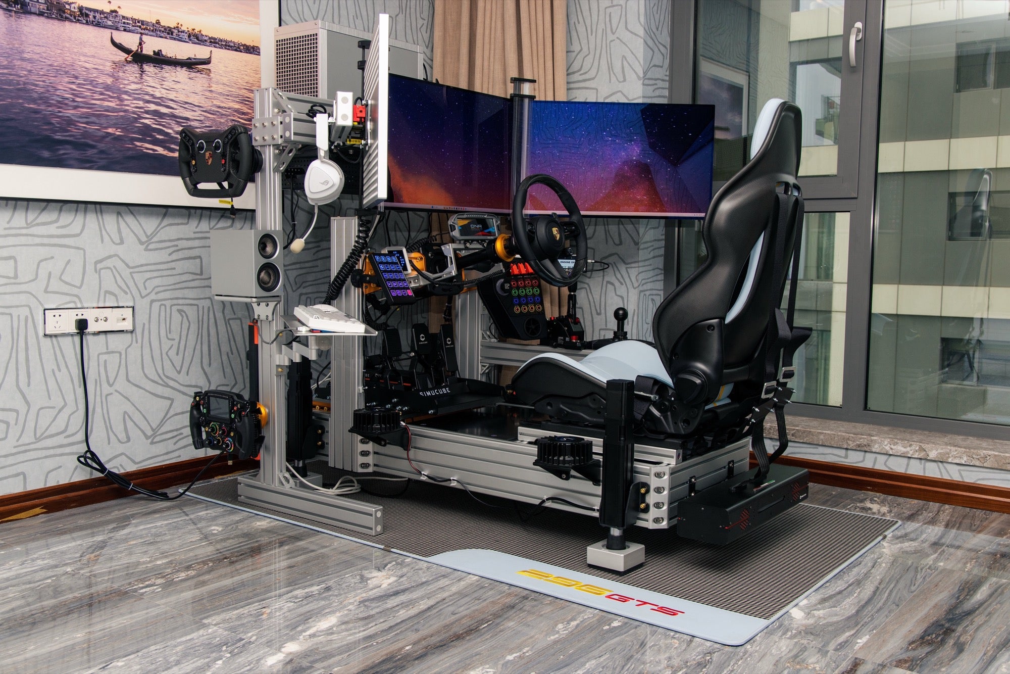 KCLAB owner's silver aluminum profile motion simulator rig